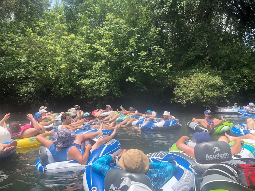 Austin: San Marco River BYOB Guided Tubing Expereince - The transfer to San Marcos: when the group energy builds